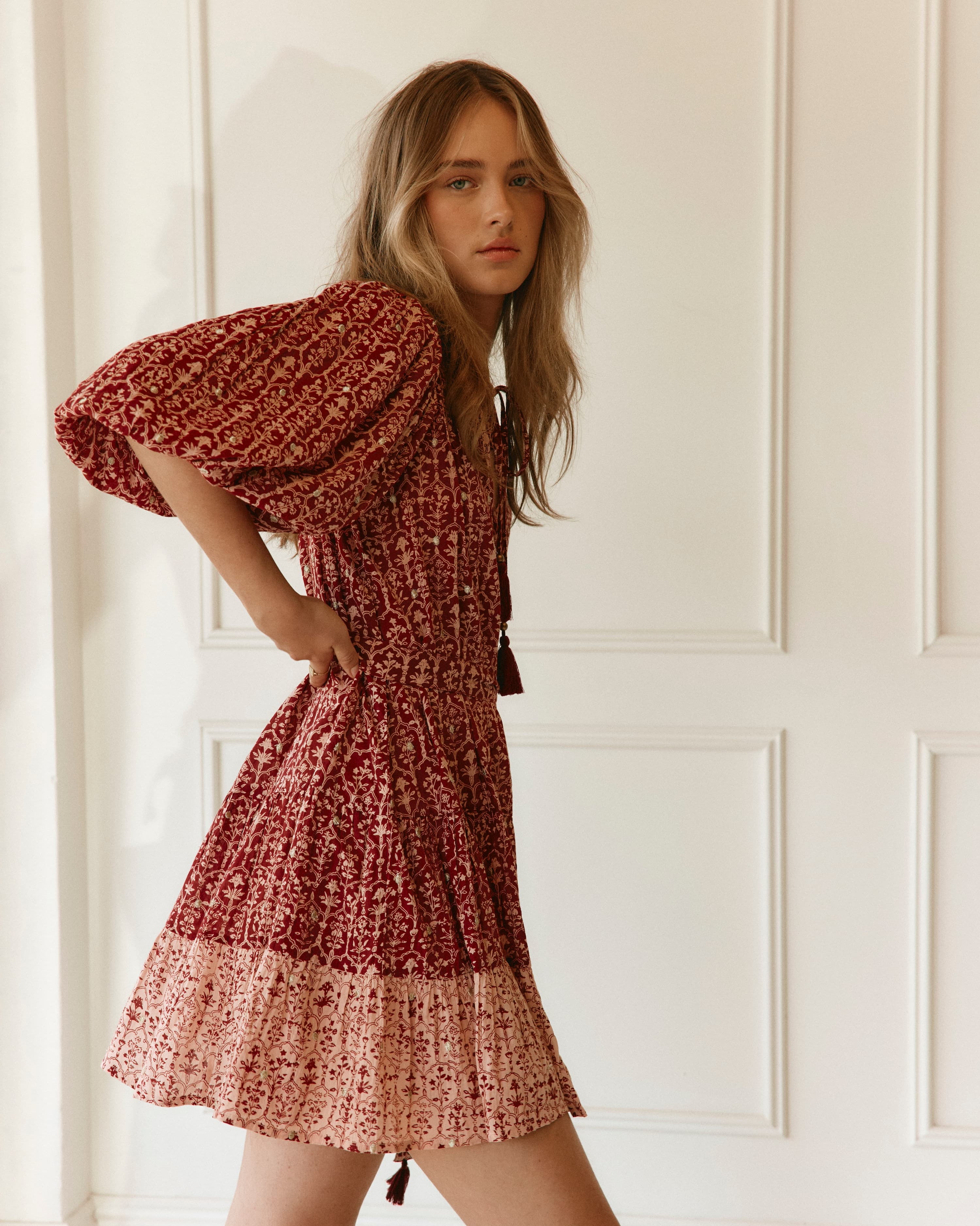 Lakoen model wears our Emile Short dress in soft printed cotton, in rose pink & merlot hues, with delicate gold lurex embroidered dots - slow fashion - hand-crafted - ethically made