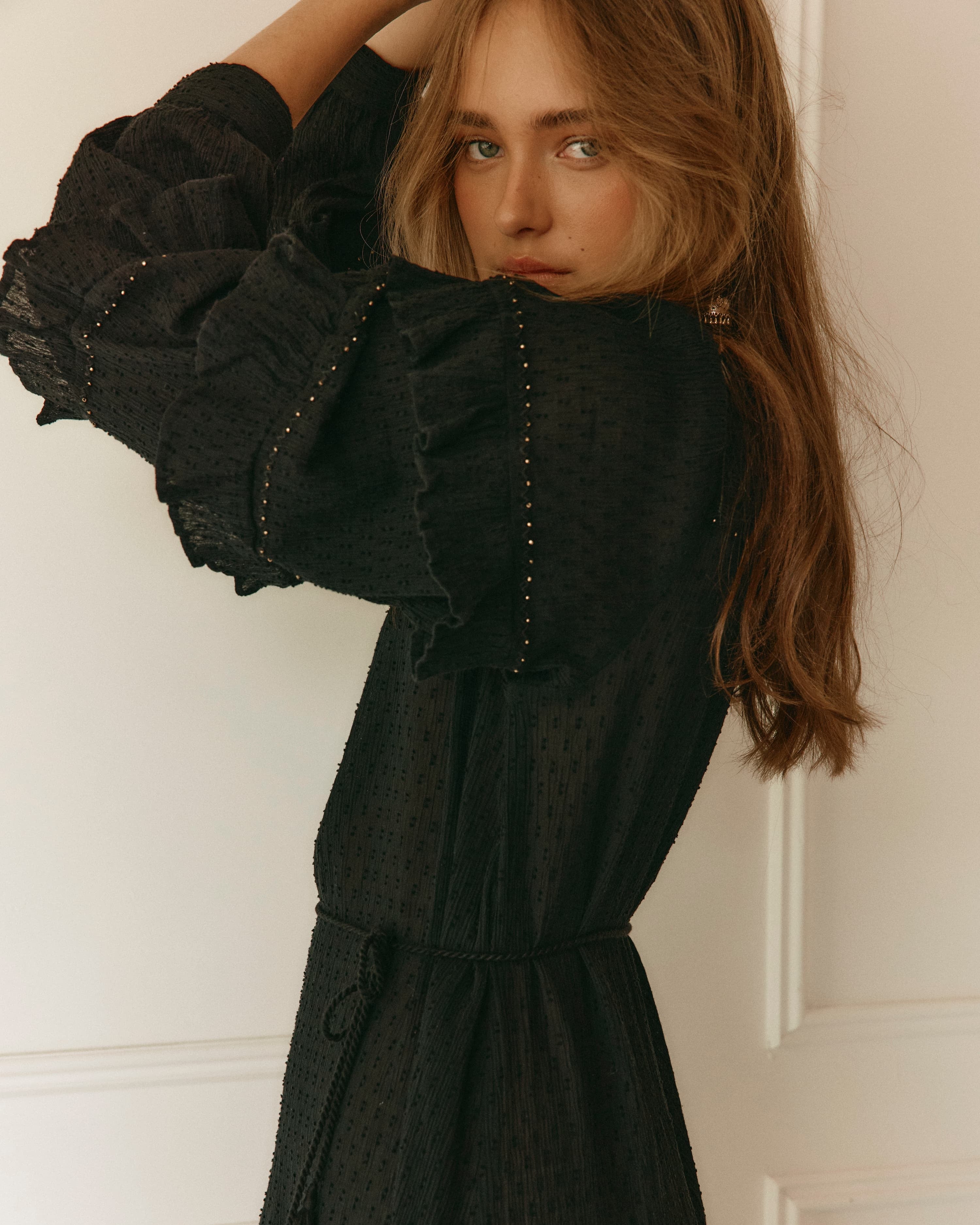 Lakoen Anais Dress in black cotton with gold beading flounced sleeves and floral embroidery