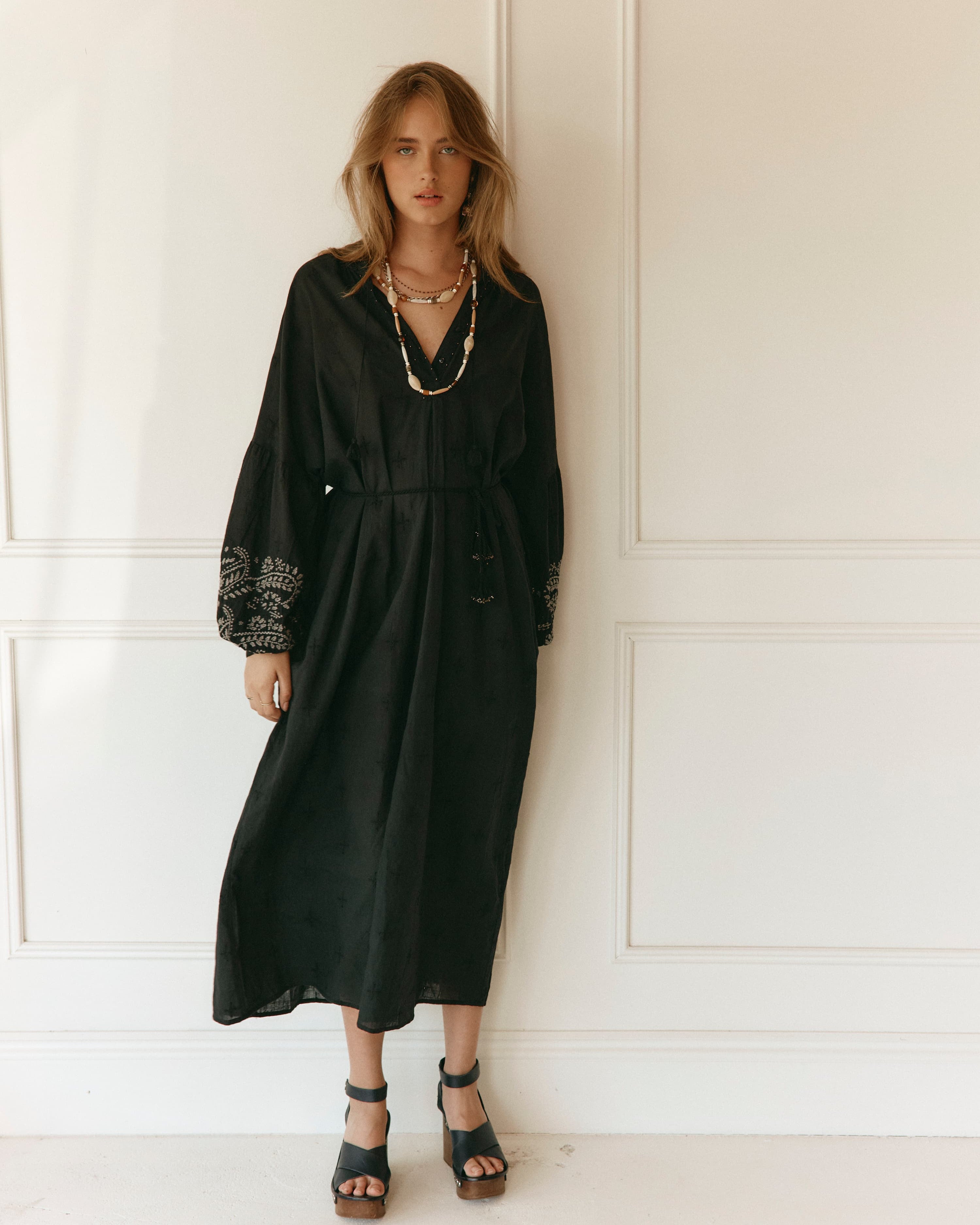 Lakoen Celeste caftan style Dress in black cotton with off white paisley embroidery and full bishop sleeves
