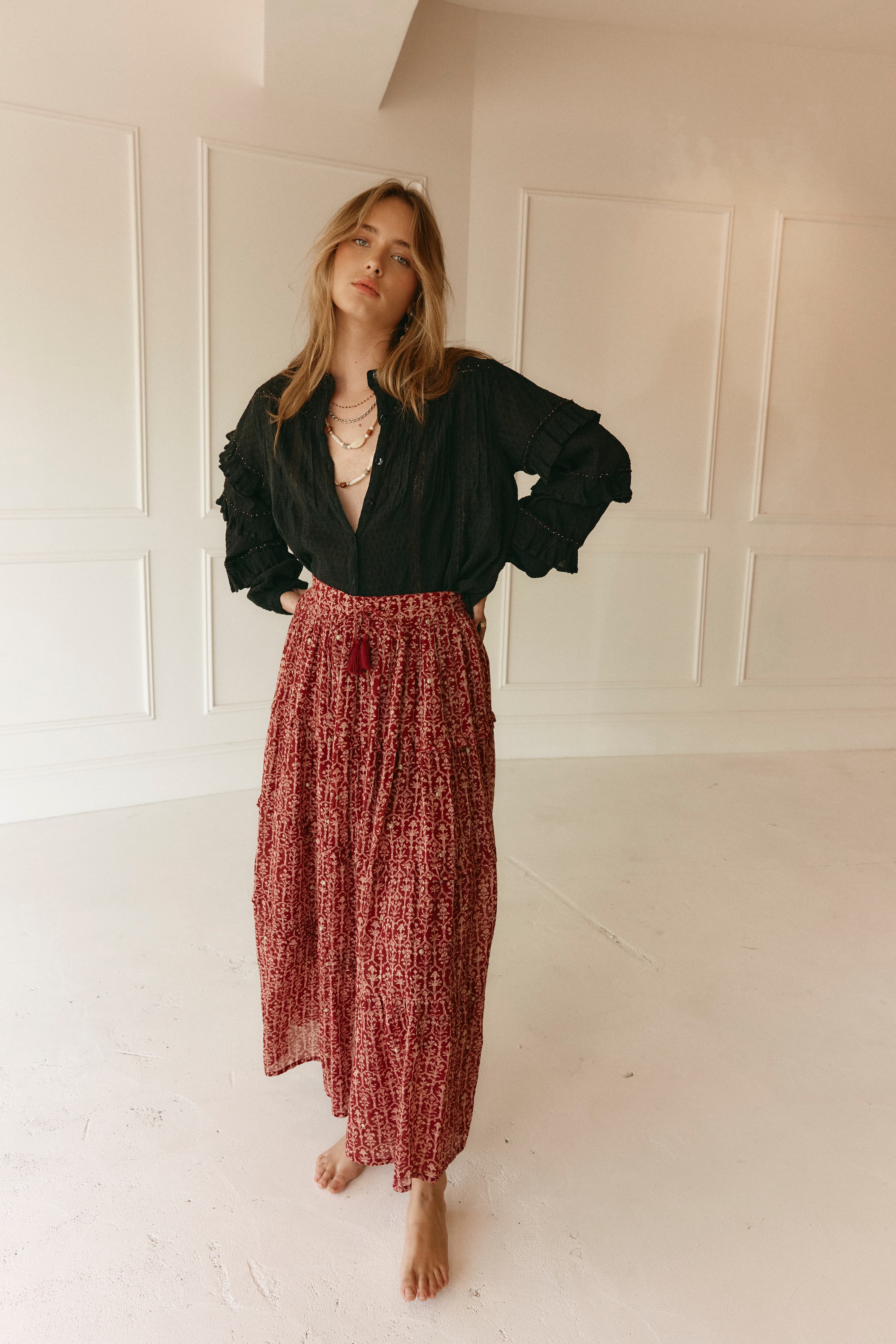 Lakoen Anais Blouse in black soft cotton with lace insets, ruffled bishop sleeves, shirring and tonal embroidery