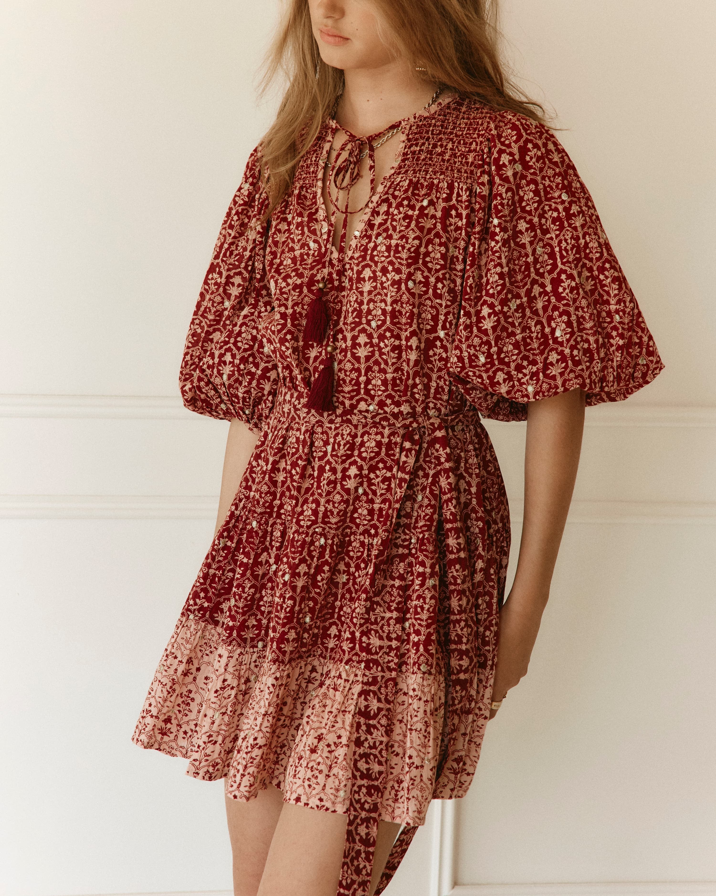 Lakoen model wears our Emile Short dress in soft printed cotton, in rose pink & merlot hues, with delicate gold lurex embroidered dots - slow fashion - hand-crafted - ethically made