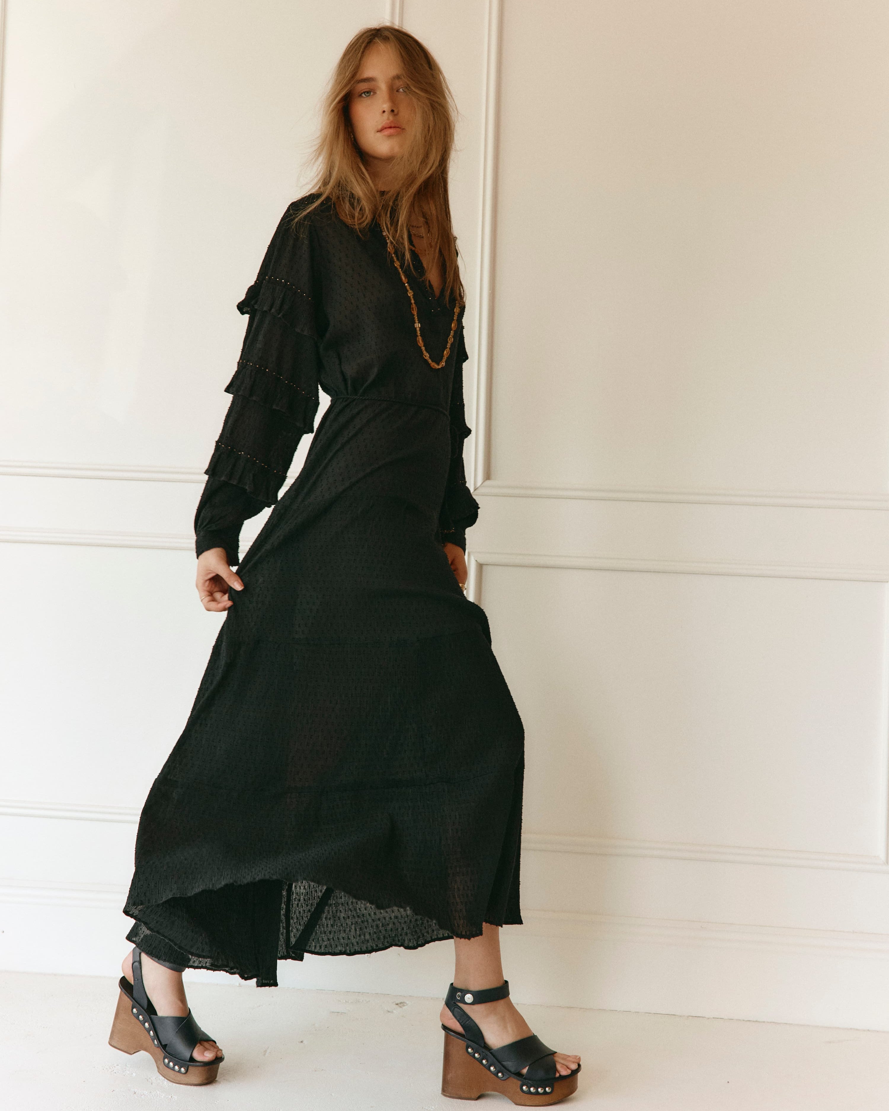 Lakoen Anais Dress in black cotton with gold beading flounced sleeves and floral embroidery