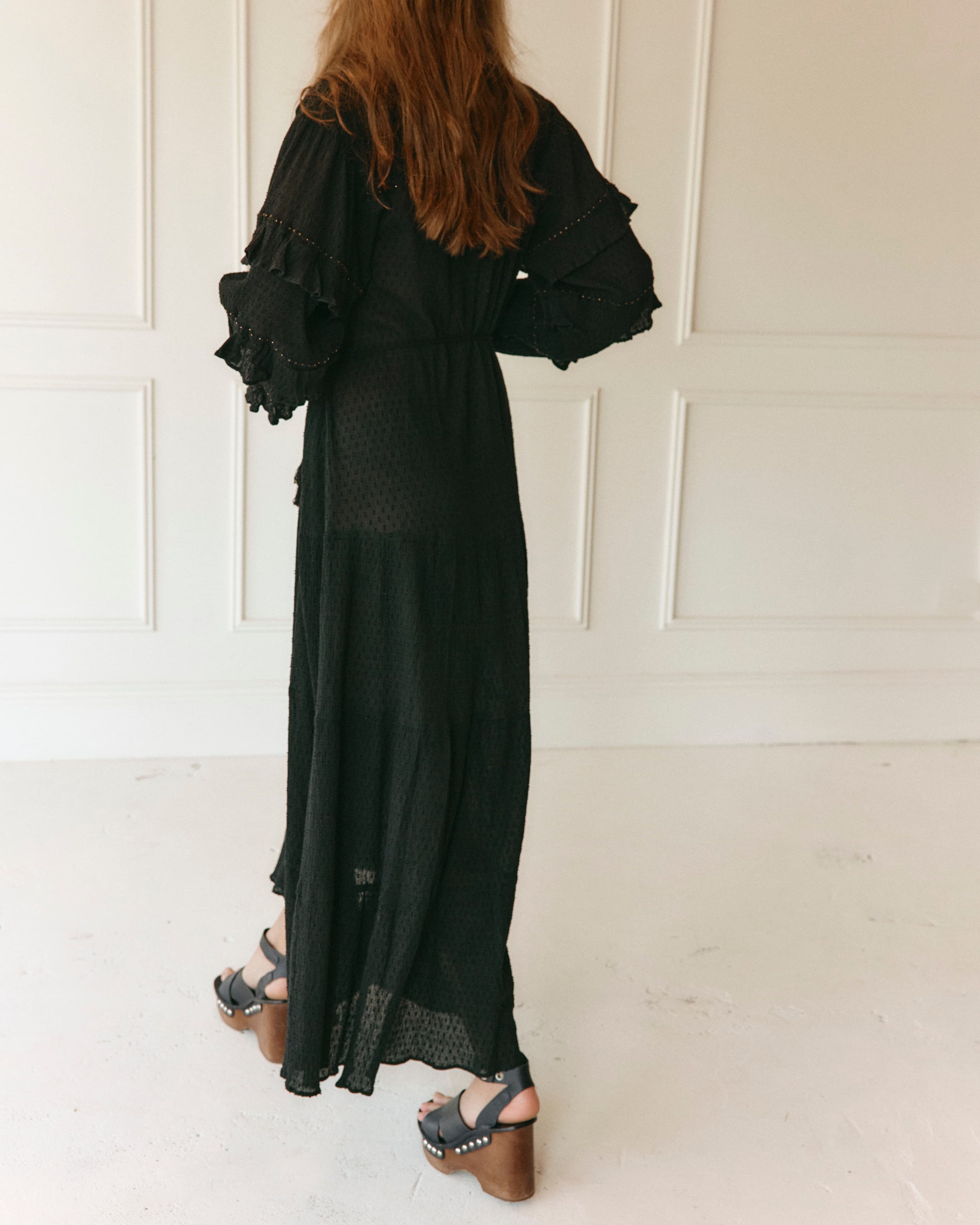 Lakoen Anais Dress in black cotton with gold beading flounced sleeves and floral embroidery