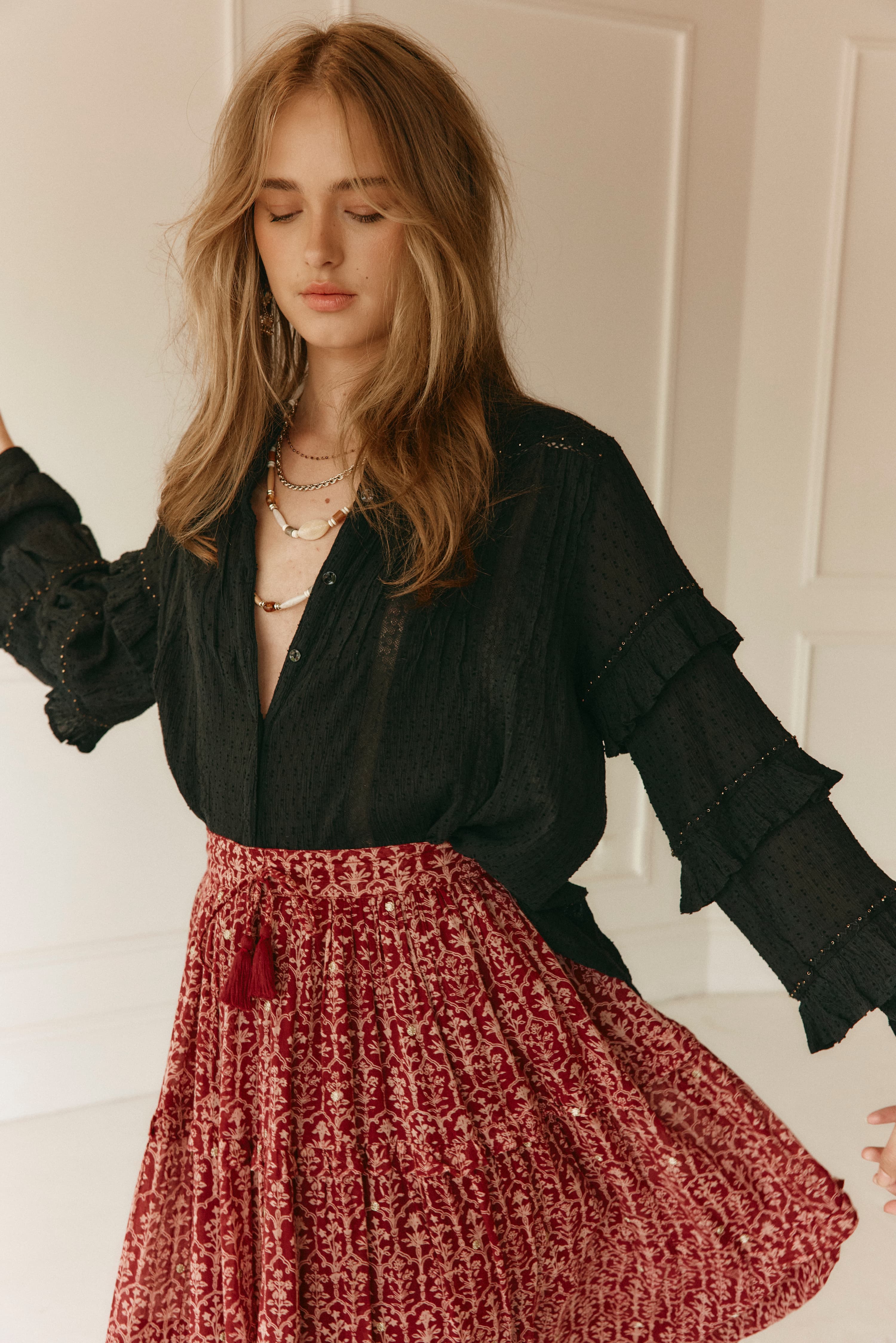 Lakoen Anais Blouse in black soft cotton with lace insets, ruffled bishop sleeves, shirring and tonal embroidery