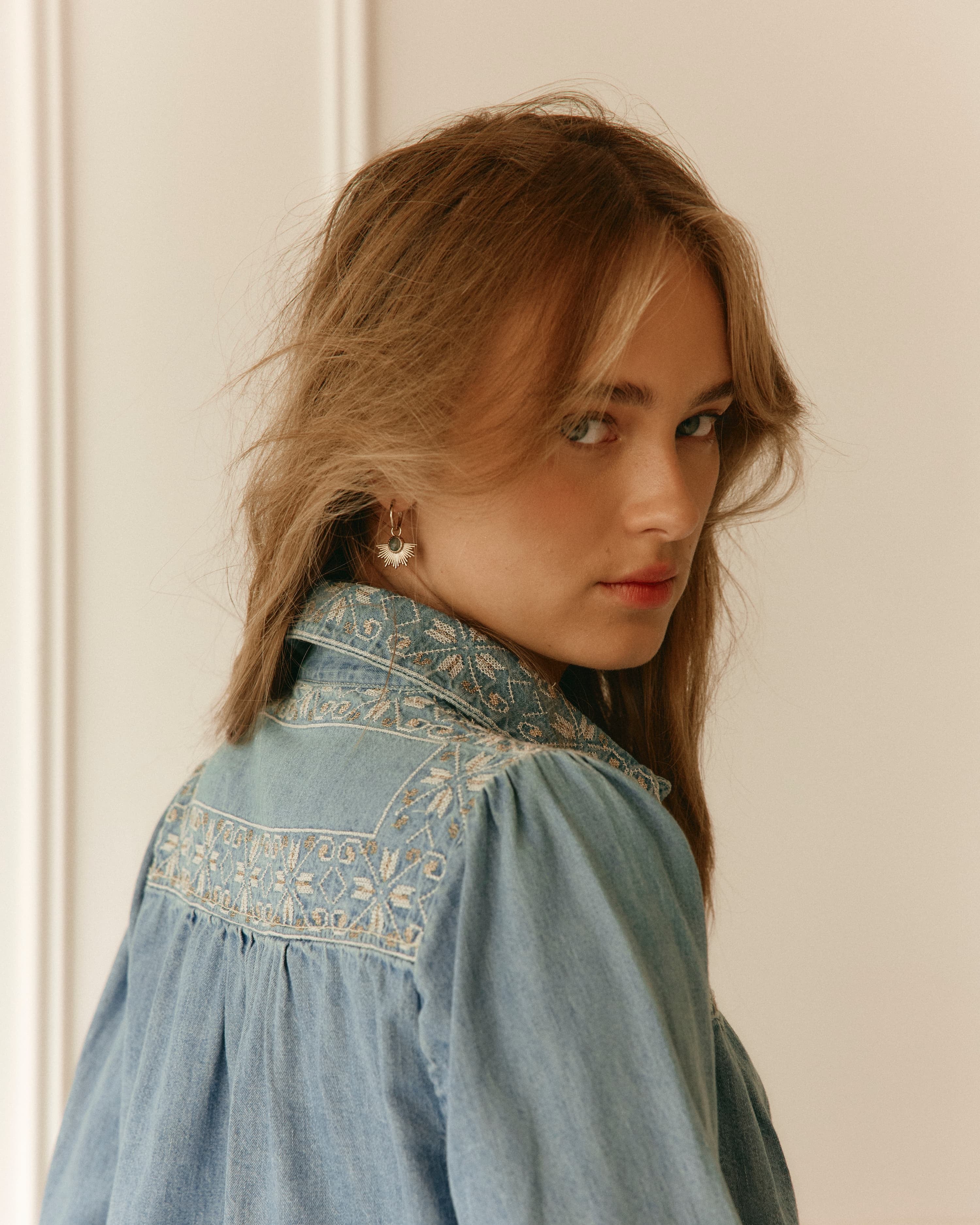 Lakoen denim dahlia blouse with embroidered yoke and brass buttons