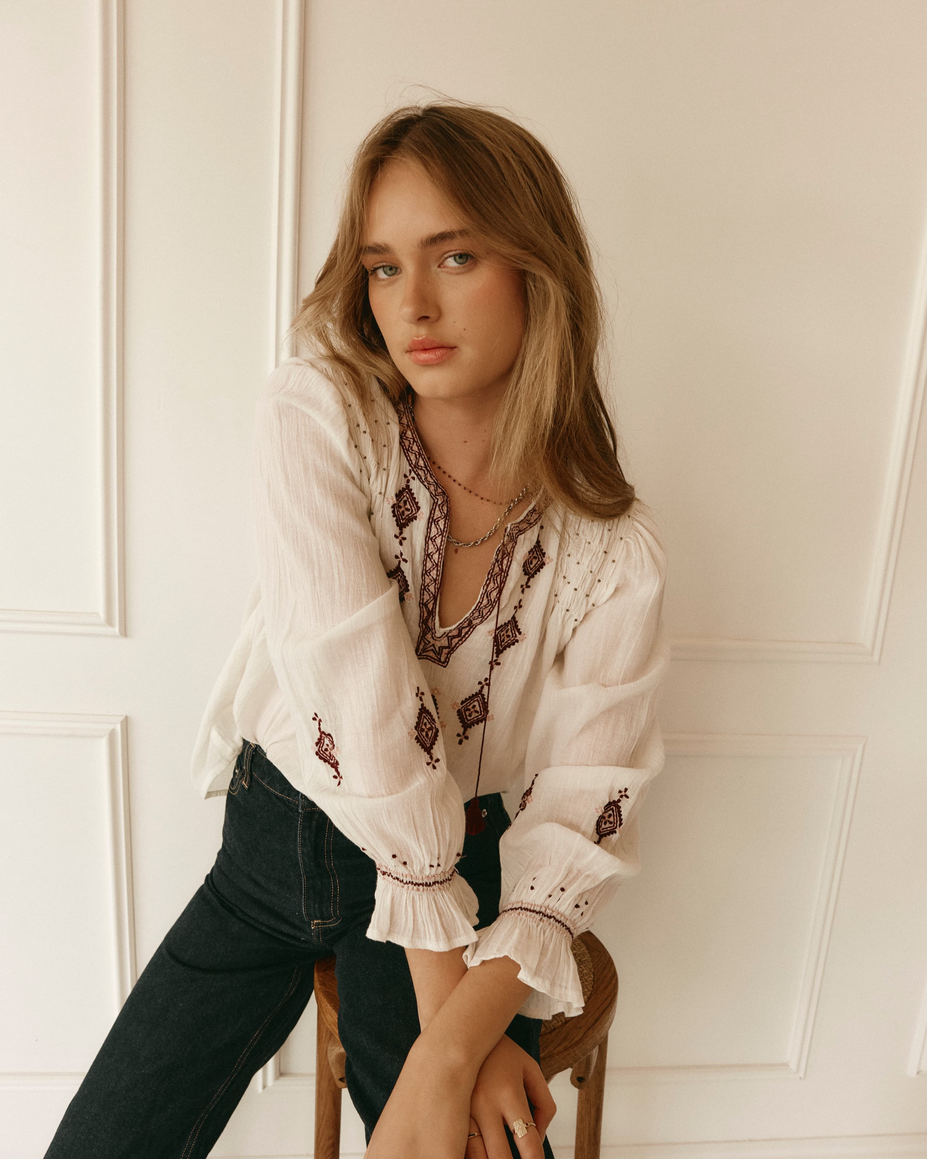 Lakoen Somi Blouse in white cotton with burgundy embroidery and hand-beaded shirring detail
