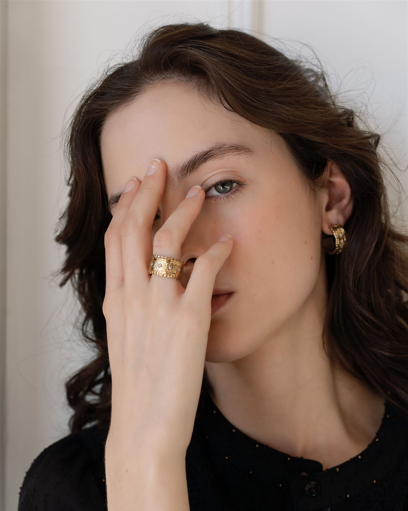 Lakoen Brass textured inca hoops with inset cubic zirconia stars and clear e-plating