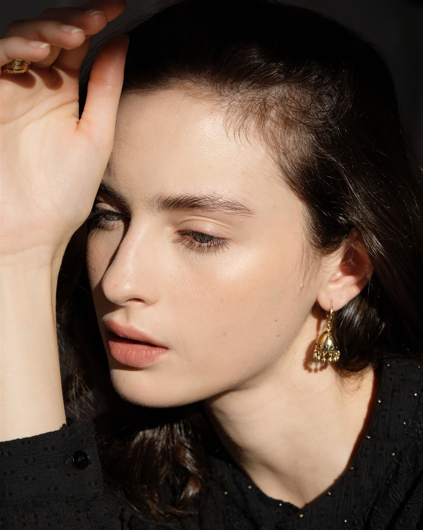 Lakoen Raya Earrings with vintage bell shape  in recycled brass with faceted onyx